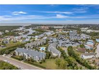 Aerial view of waterfront community with pool and marina at 5567 Sea Forest Dr # 320, New Port Richey, FL 34652
