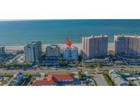 Aerial view of beachfront condo building, highlighting unit location and surrounding area at 1350 Gulf Blvd # 703 704, Clearwater, FL 33767