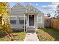Charming bungalow exterior, featuring a front walkway and well-maintained landscaping at 3327 25Th N St, St Petersburg, FL 33713