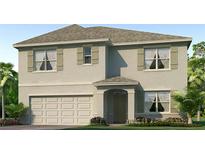 Two-story house with light beige siding, shutters, and a large garage at 35174 Valley Ridge Rd, Dade City, FL 33525