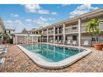 Refreshing community pool with ample deck space for lounging at 5221 Bayshore Blvd # 37, Tampa, FL 33611