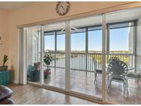 Spacious balcony with sliding glass doors offering scenic water views at 6450 Shoreline Dr # 9502, St Petersburg, FL 33708
