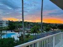 Stunning sunset view overlooking the community pool and lush landscape at 6315 Shoreline Dr # 3306, St Petersburg, FL 33708