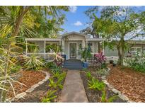 Charming bungalow with a welcoming front porch and beautifully landscaped yard at 2126 7Th N Ave, St Petersburg, FL 33713