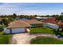 Property features a pool, boat dock, and waterfront access at 9773 1St Ne St, St Petersburg, FL 33702