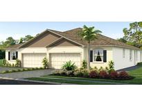 Two-car garage and attractive curb appeal at 32652 Rustic Rise Rd, San Antonio, FL 33576