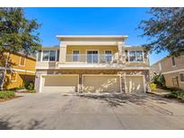 Two-story townhome with three-car garage and balcony at 7001 Interbay Blvd # 313, Tampa, FL 33616