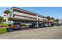 Covered parking area with ample spaces for residents at 2587 Countryside Blvd # 6303, Clearwater, FL 33761