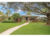 Single-story home with landscaped yard and walkway at 266 Snell Isle Ne Blvd, St Petersburg, FL 33704