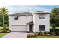 Two-story house with light-beige exterior, dark-gray door, and landscaping at 3040 Living Coral St, Wimauma, FL 33598