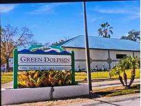 Green Dolphin Villas, Garden & Golf Course Condominiums signage at 1250 S Pinellas Ave # 713, Tarpon Springs, FL 34689