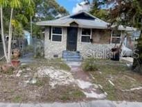 Fixer-upper home with stone exterior, needs renovation at 615 Newton S Ave, St Petersburg, FL 33701