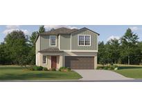 Two-story house with green and beige siding, brown garage door, and landscaping at 35246 Gravelly Dr, Zephyrhills, FL 33541