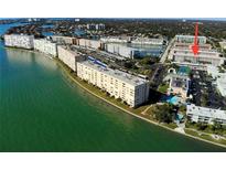 Aerial view showcasing building location and waterfront amenities at 3128 59Th S St # 410, Gulfport, FL 33707