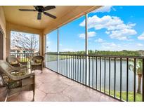 Relaxing screened balcony overlooking a lake, perfect for enjoying Florida's natural beauty at 6363 99Th N Way # 12A, St Petersburg, FL 33708