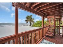 Stunning ocean view from a private deck with stairs at 18838 Gulf Blvd # 202, Indian Shores, FL 33785