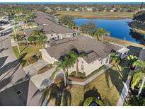 Aerial view of a house and golf course community at 2029 Inverness Greens Dr # 2029, Sun City Center, FL 33573