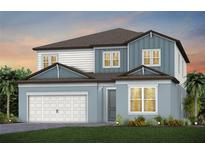 Two-story home with blue and white siding, brown roof, and a two-car garage at 12652 Glenn Creek Dr, Riverview, FL 33569