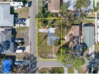 Aerial view of a single-story house with a yard at 1701 Mississippi Ne Ave, St Petersburg, FL 33703