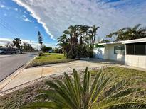 Single-story home with a spacious front yard and driveway at 7125 14Th S Ave, South Pasadena, FL 33707