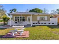 Charming single-story home with a well-maintained lawn and cozy front patio at 4300 9Th N Ave, St Petersburg, FL 33713