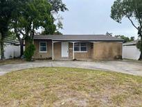 Cute single story home with a large front yard at 6102 Massachusetts Ave, New Port Richey, FL 34653