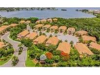 Aerial view of Banyan Bay community, showing lakefront location and numerous townhouses at 130 Banyan Bay Dr, St Petersburg, FL 33705
