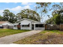 Ranch style home with a large yard at 605 Shore E Dr, Oldsmar, FL 34677