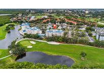 Aerial view of condo community near golf course and water at 2333 Feather Sound Dr # A511, Clearwater, FL 33762