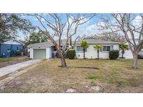 Charming single story home with a well-maintained lawn and attached garage at 5927 3Rd N Ave, St Petersburg, FL 33710