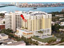 Aerial view of a high-rise building with city and water views at 628 Cleveland St # 1201, Clearwater, FL 33755