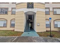 Exterior view of building showing entrance and staircase at 17108 Carrington Park Dr # 710, Tampa, FL 33647