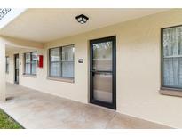 Condo building exterior showcasing a well-maintained entrance at 4920 Locust Ne St # 116, St Petersburg, FL 33703