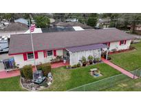 Aerial view of single-story home with spacious yard, RV parking, and pool at 12002 Washington St, Seffner, FL 33584