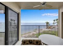 Stunning water view from balcony with patio furniture at 6322 Palma Del Mar S Blvd # 209, St Petersburg, FL 33715