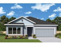 One-story home with gray siding, dark blue door, and two-car garage at 11853 Mile Marsh Dr, Riverview, FL 33569