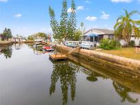 Charming waterfront home with private dock and boat slips at 6800 Sanderling Ln, Hudson, FL 34667