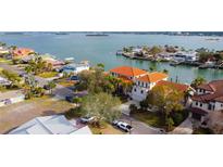 Luxury home with canal views and private boat dockage at 301 Midway Is, Clearwater Beach, FL 33767