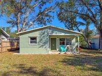Charming single-story home with a well-maintained yard and mature trees creating a welcoming curb appeal at 364 3Rd Nw St, Largo, FL 33770