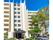 Exterior view of a condo building with landscaping and parking at 5020 Bayshore Blvd # 403, Tampa, FL 33611