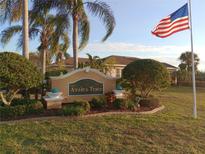 Azalea Trace community entrance sign with landscaping at 1950 Sterling Glen Ct, Sun City Center, FL 33573