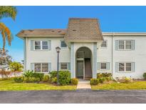 Front view of a light blue building with a dark gray roof at 231 S Mcmullen Booth Rd # 54, Clearwater, FL 33759