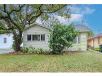 Charming single story home with a spacious yard and mature trees at 310 W Hilda St, Tampa, FL 33603