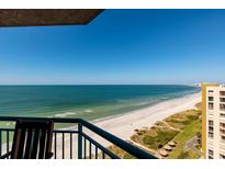 Breathtaking balcony view of ocean, beach, and coastline at 1520 Gulf Blvd # 1404, Clearwater Beach, FL 33767