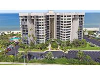 Oceanfront building with parking and a pool, offering stunning coastal views at 1660 Gulf Blvd # Ph1, Clearwater Beach, FL 33767