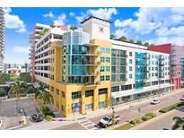 Modern building exterior with unique architecture and city views at 1208 E Kennedy Blvd # 410, Tampa, FL 33602