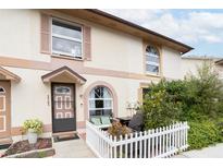 Inviting exterior with a private patio and well-maintained landscaping at 3303 Brigadoon Dr, Clearwater, FL 33759