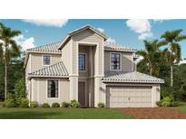 Two-story house with beige siding, tile roof, and a two-car garage at 14940 Serene Shores Loop, Bradenton, FL 34211