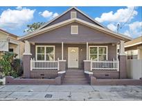 Charming craftsman home with a front porch and well-manicured landscaping at 2912 N 16Th St # 1/2, Tampa, FL 33605