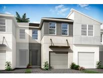 Modern two-story townhome with attached garage and landscaping at 3239 Feather Haven Pl, Brandon, FL 33511